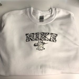 Nike cow print spell out crewneck